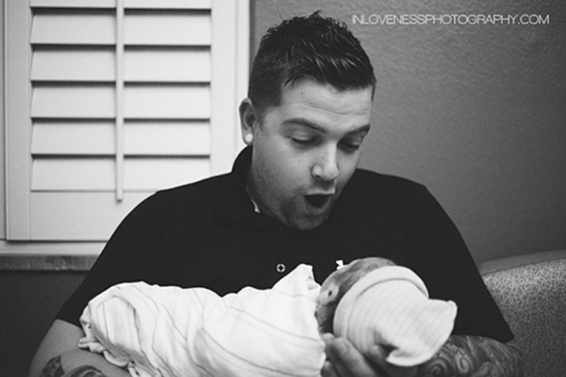 Dads see their newborn babies for the first time Dads see their newborn babies for the first time