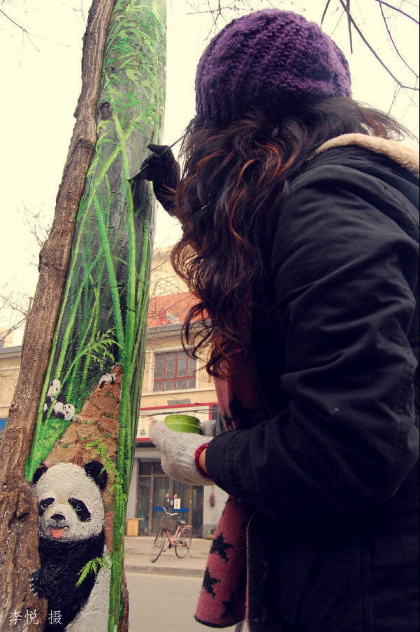 Drawings on the trees cheer up the townspeople