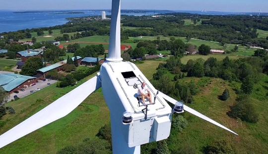 Drone caught sunbathing on a windmill