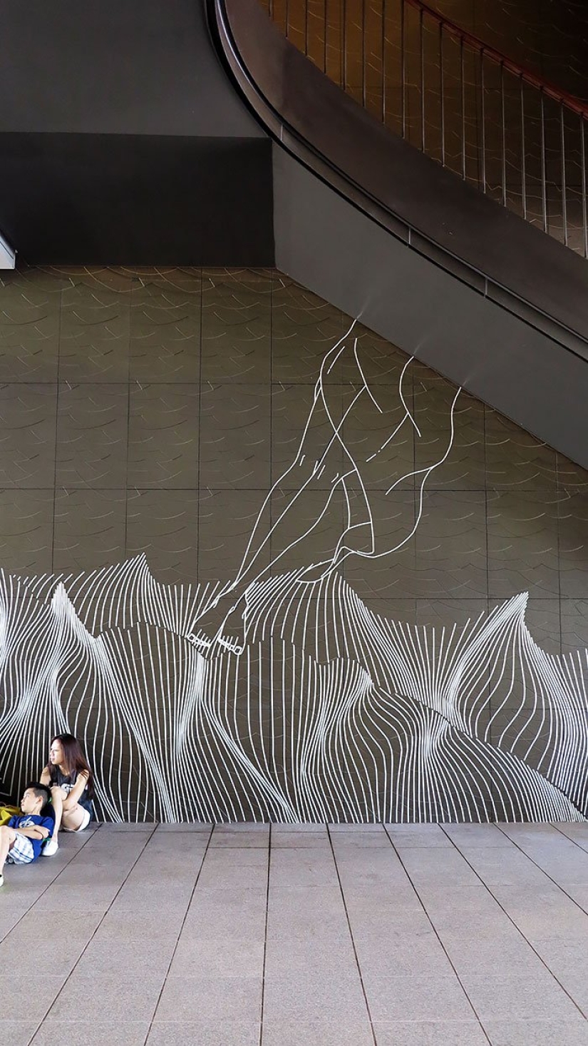 Electrical tape instead of paint. Beautiful street art from improvised materials