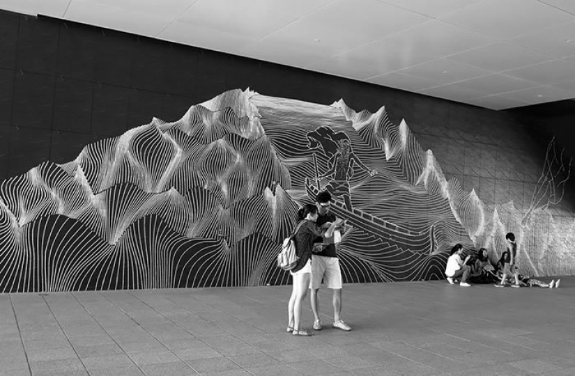 Electrical tape instead of paint. Beautiful street art from improvised materials