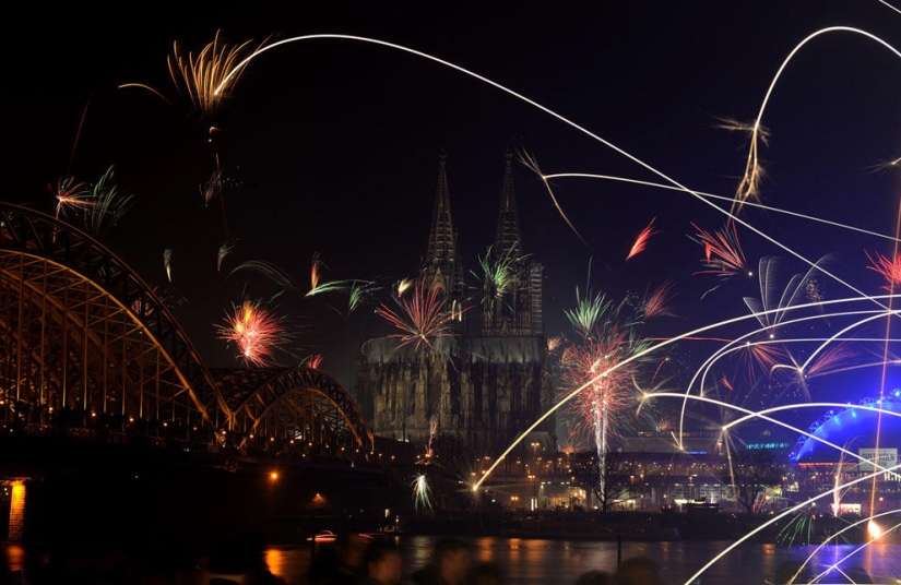 Fireworks, beaches and champagne - how the world met the new year 2014