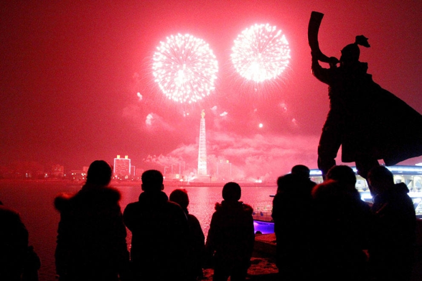 Fireworks, beaches and champagne - how the world met the new year 2014