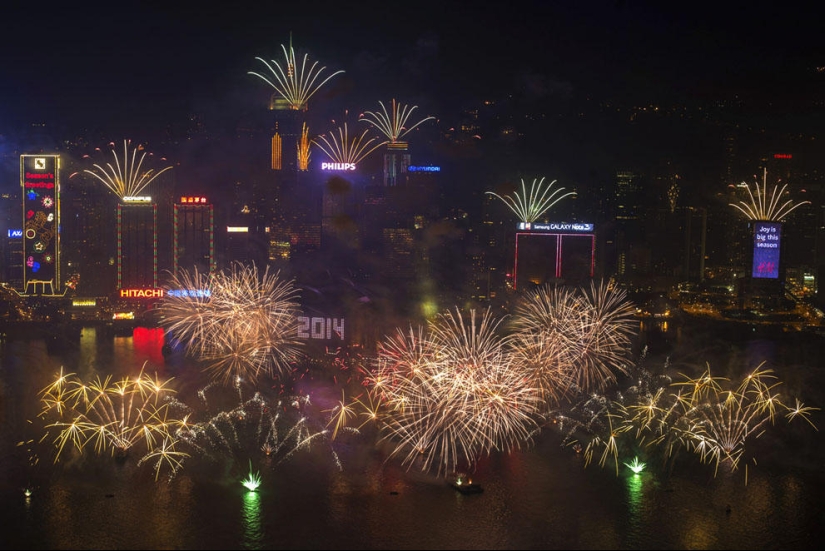 Fireworks, beaches and champagne - how the world met the new year 2014