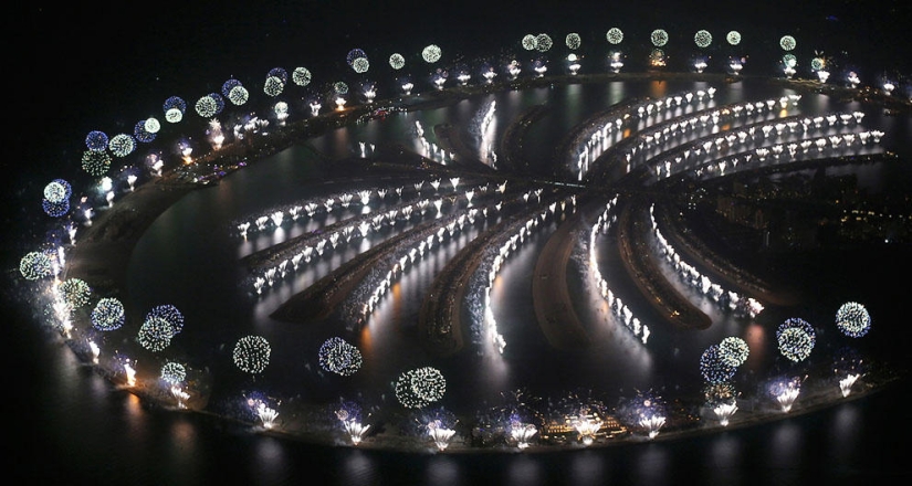 Fireworks, beaches and champagne - how the world met the new year 2014