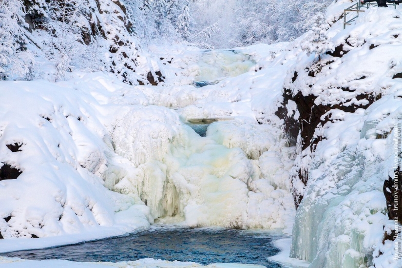 “Frozen, but not frozen” - Kivach waterfall in winter “Frozen, but not frozen” - Kivach waterfall in winter