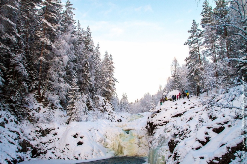 “Frozen, but not frozen” - Kivach waterfall in winter “Frozen, but not frozen” - Kivach waterfall in winter