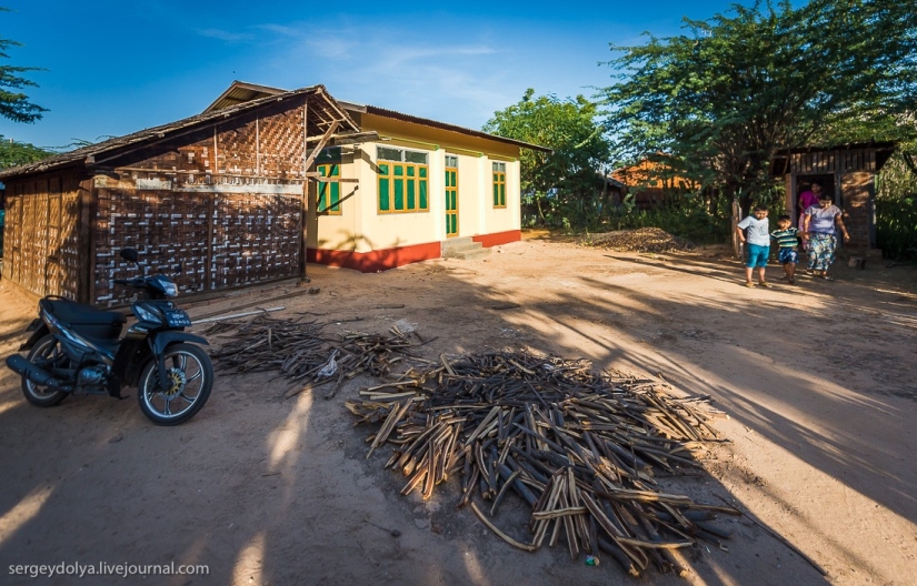 How is life in a wealthy village in Burma?
