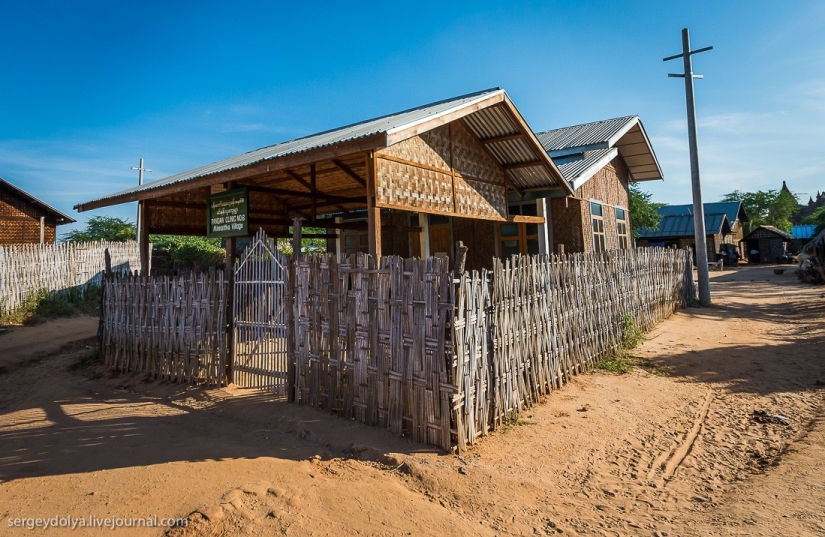 How is life in a wealthy village in Burma?