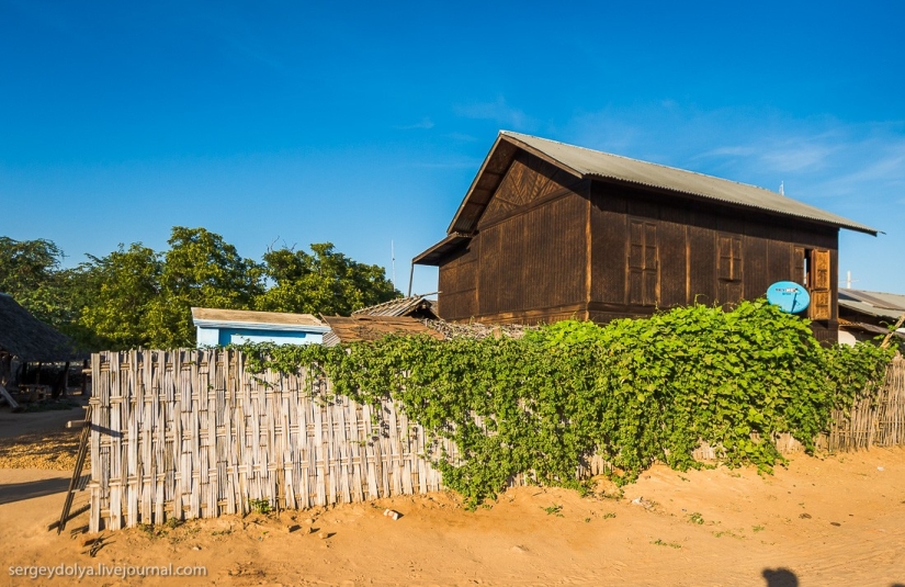 How is life in a wealthy village in Burma?