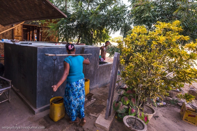 How is life in a wealthy village in Burma?