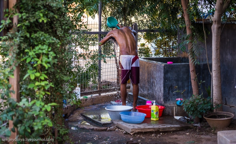 How is life in a wealthy village in Burma?
