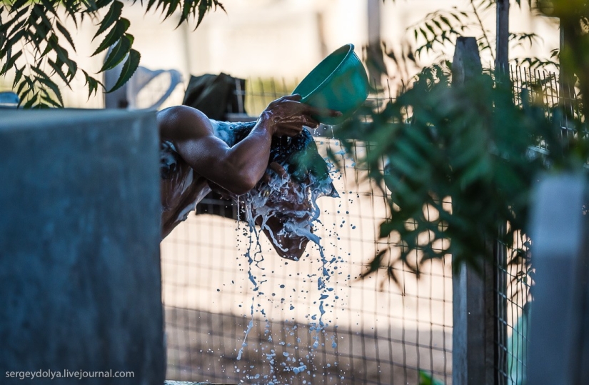How is life in a wealthy village in Burma?
