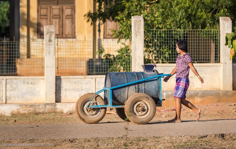 How is life in a wealthy village in Burma?