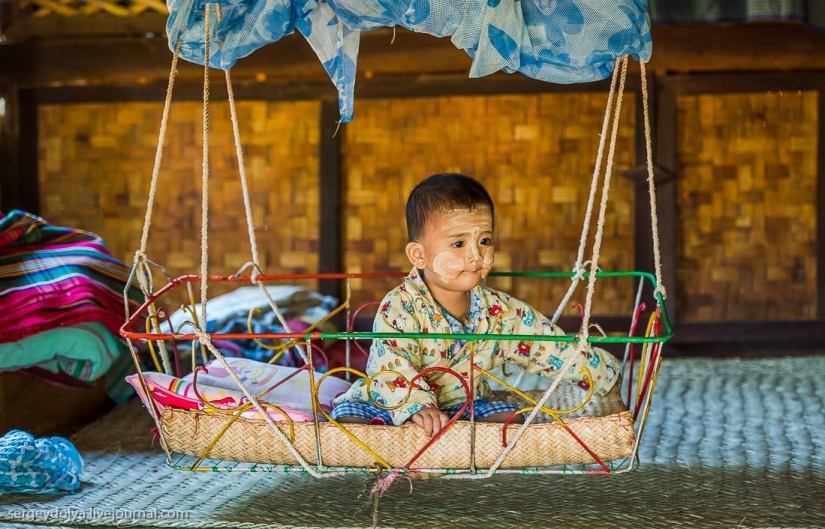 How is life in a wealthy village in Burma?