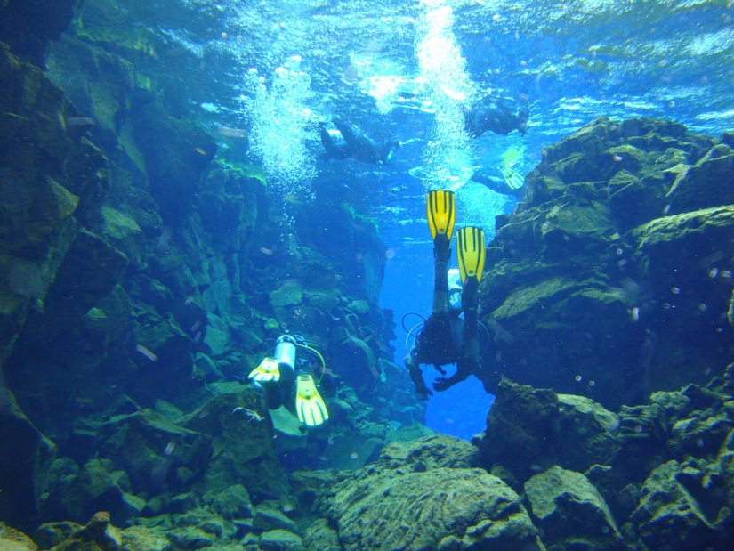 Icelandic fault Silfra - between two parts of the world Icelandic fault Silfra - between two parts of the world