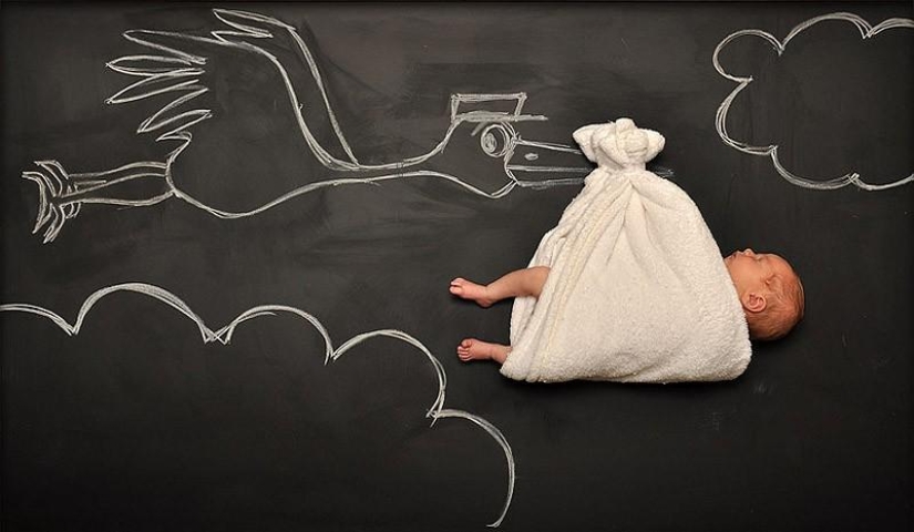 Mamá toma una foto del bebé en el "Tablero de aventuras" Mamá toma una foto del bebé en el "Tablero de aventuras"