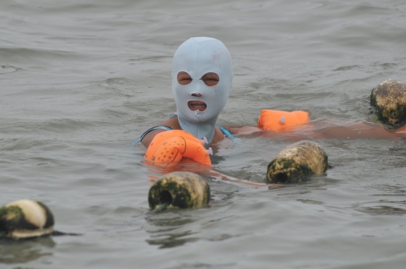 Moda en las playas chinas - facekini