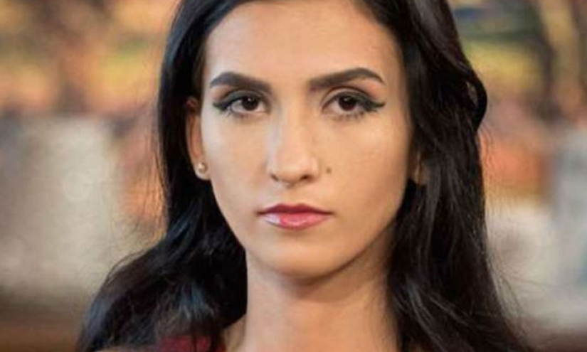 Romanian woman sold her innocence at auction to help her family