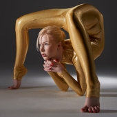 Snake woman photographed for the calendar for 2015 Snake woman photographed for the calendar for 2015