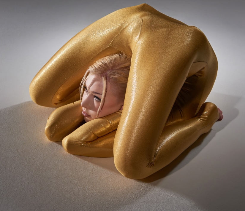 Snake woman photographed for the calendar for 2015 Snake woman photographed for the calendar for 2015