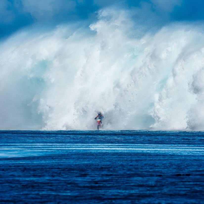 Surfing legend: Robbie Maddison rides a wave on a motorcycle