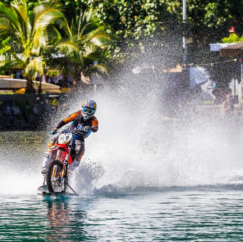 Surfing legend: Robbie Maddison rides a wave on a motorcycle