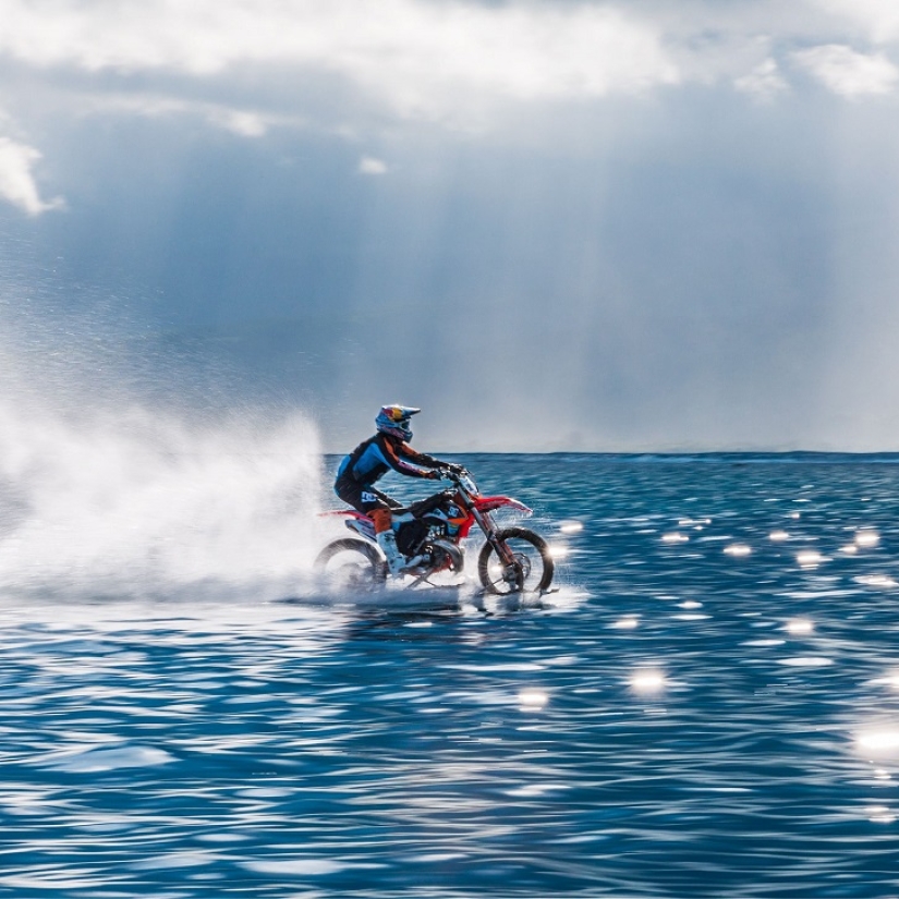 Surfing legend: Robbie Maddison rides a wave on a motorcycle