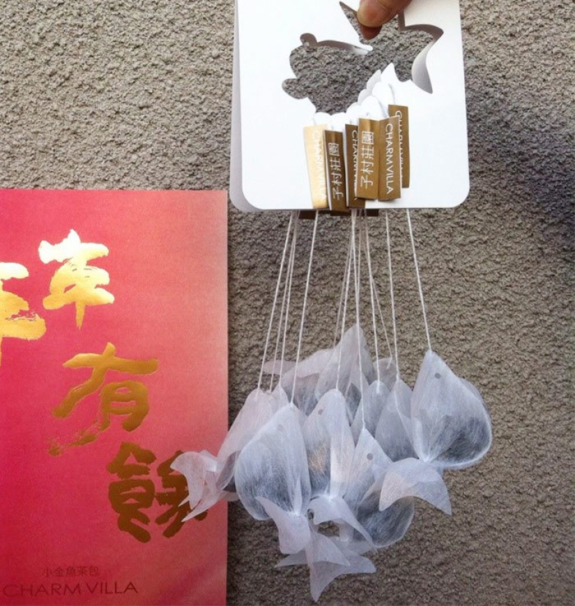 Tea bags that transform an ordinary cup into an aquarium with a goldfish