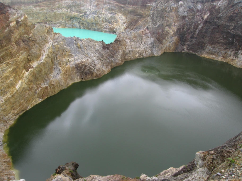 Unique tricolor lakes in the crater of the Kelimutu volcano Unique tricolor lakes in the crater of the Kelimutu volcano