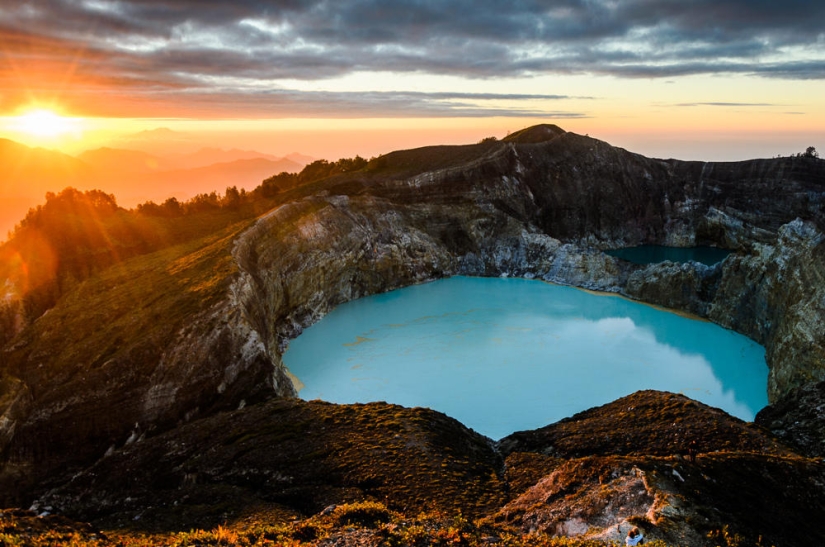 Unique tricolor lakes in the crater of the Kelimutu volcano Unique tricolor lakes in the crater of the Kelimutu volcano