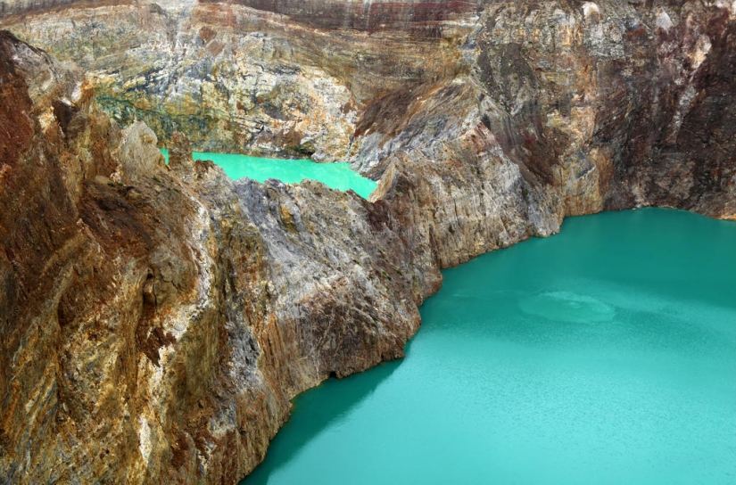 Unique tricolor lakes in the crater of the Kelimutu volcano Unique tricolor lakes in the crater of the Kelimutu volcano