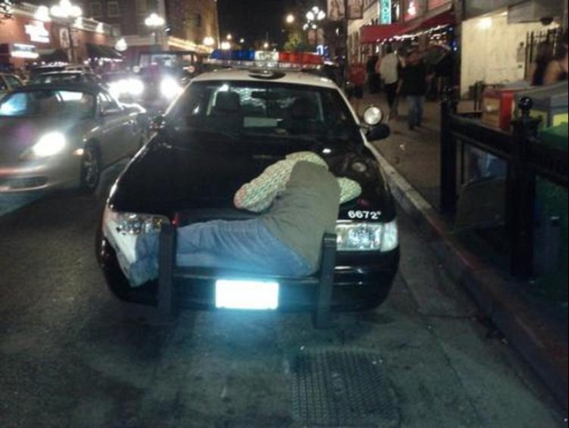 22 photos of people asleep in the most unexpected places