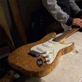 How to create a unique guitar? We need 500 dollars, 1200 colored pencils, enthusiasm and time