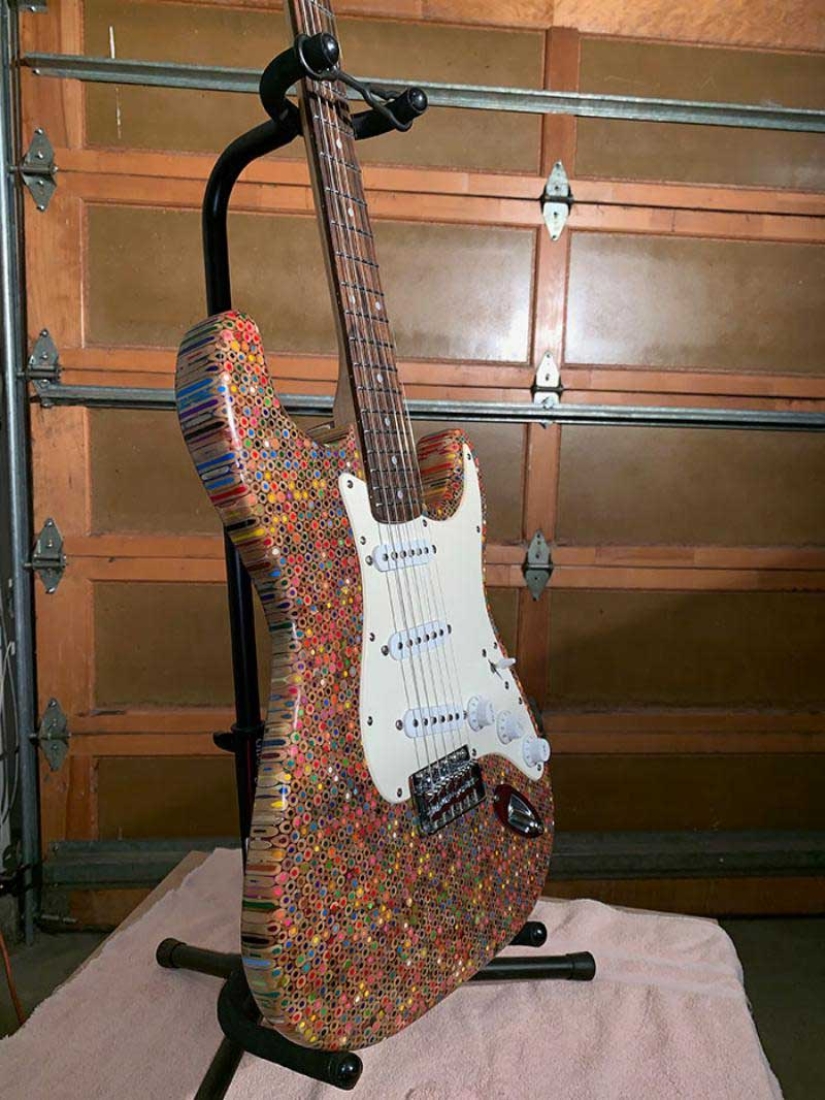 How to create a unique guitar? We need 500 dollars, 1200 colored pencils, enthusiasm and time