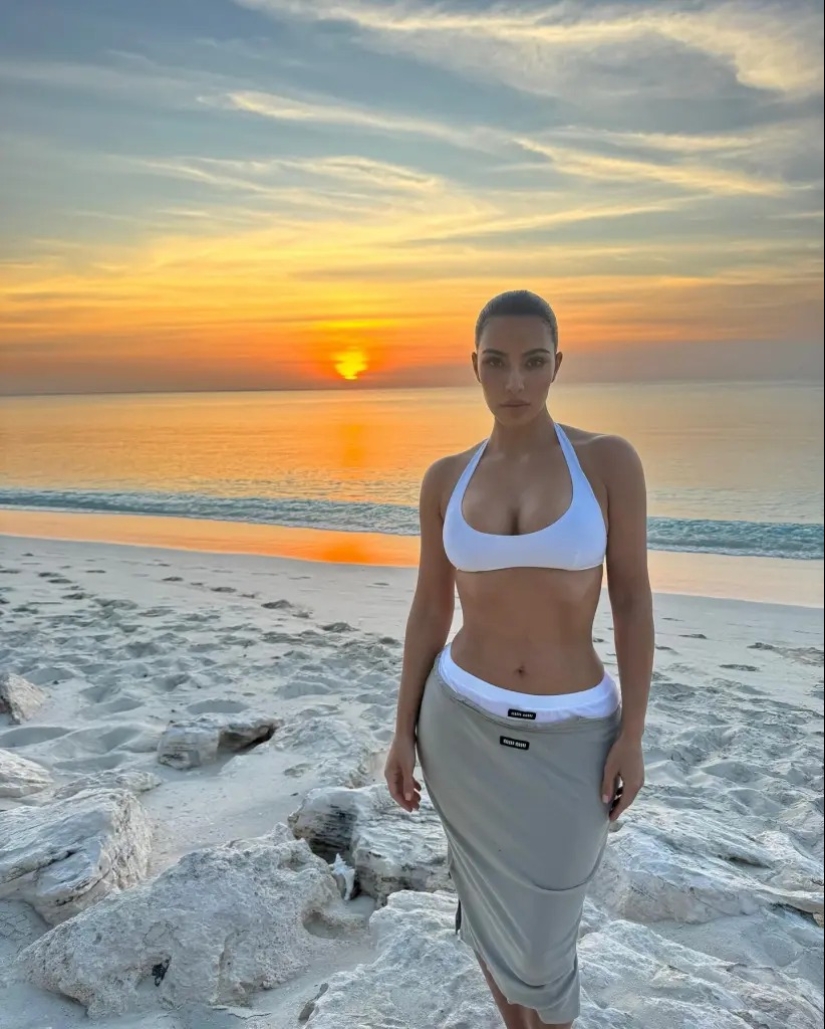 Kim Kardashian heats up spring break in a tiny bikini and body chains: ‘Cake Boss’