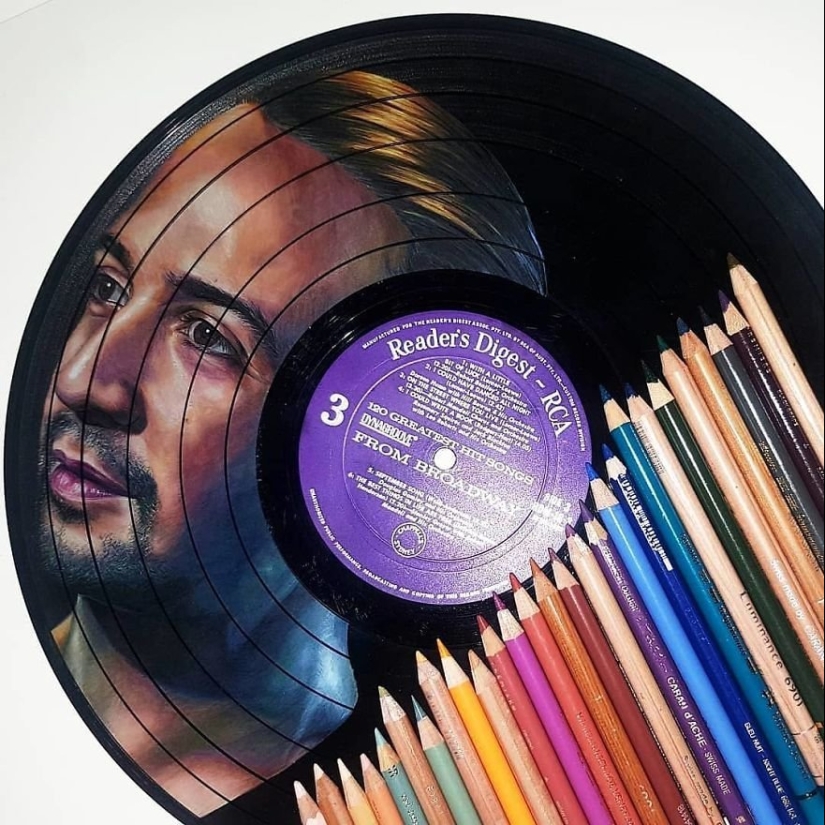 The artist turns old vinyl records into works of art