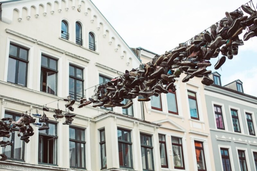6 theories explaining the strange custom of hanging shoes on wires