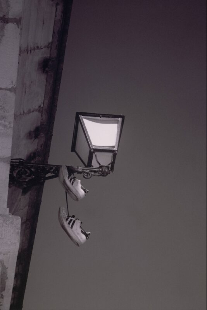 6 theories explaining the strange custom of hanging shoes on wires