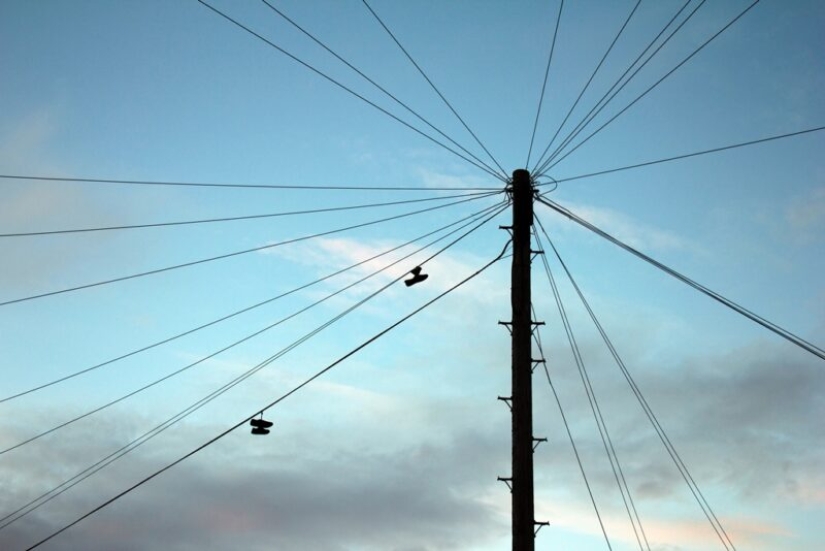 6 theories explaining the strange custom of hanging shoes on wires