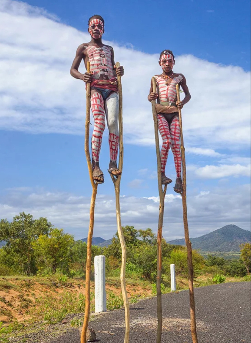 Always on top: why Banna men prefer to walk on stilts