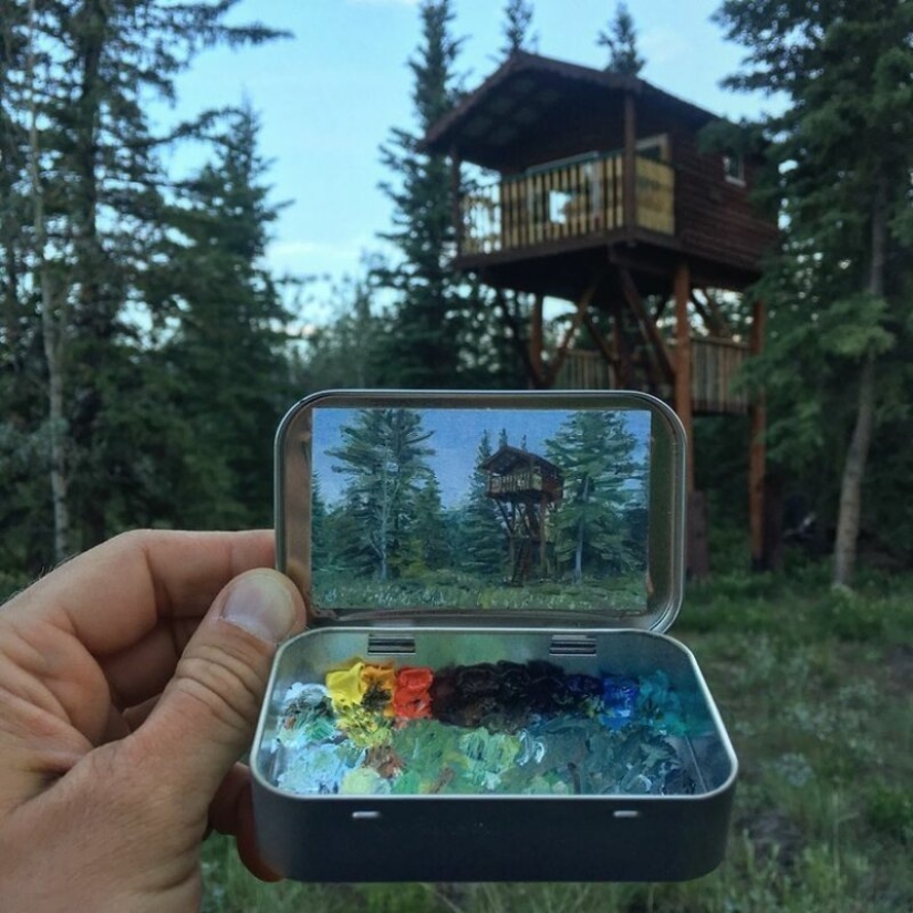 Artista dibuja las miniaturas de los paisajes en las cajas del caramelo