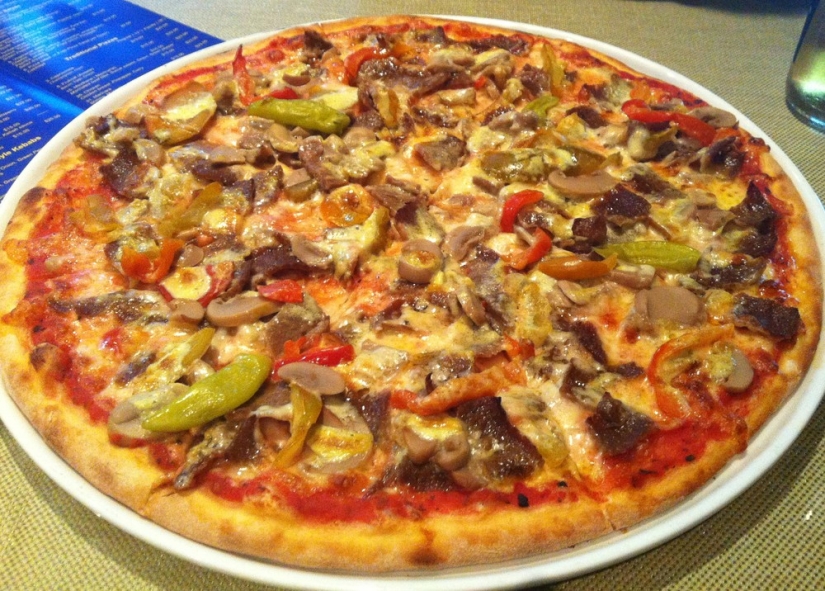 Cómo se sirve la pizza en diferentes países del mundo Cómo se sirve la pizza en diferentes países del mundo