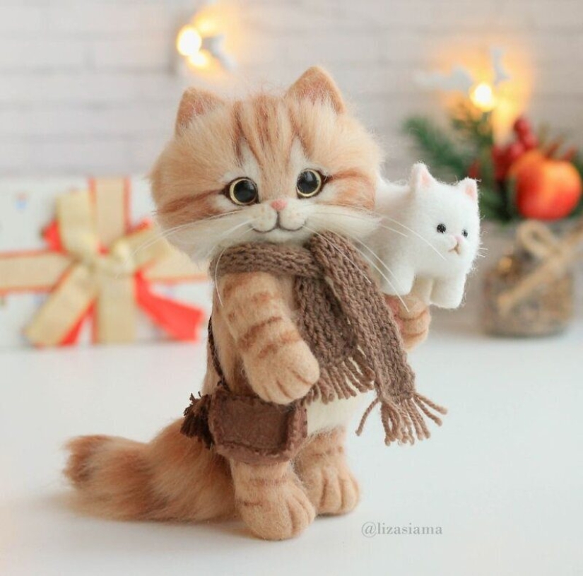 Cute kittens made of felt from the needlewoman Elizabeth Delektorskaya