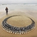 El artista crea el estado de ánimo de sus impresionantes obras de las piedras en la playa El artista crea el estado de ánimo de sus impresionantes obras de las piedras en la playa