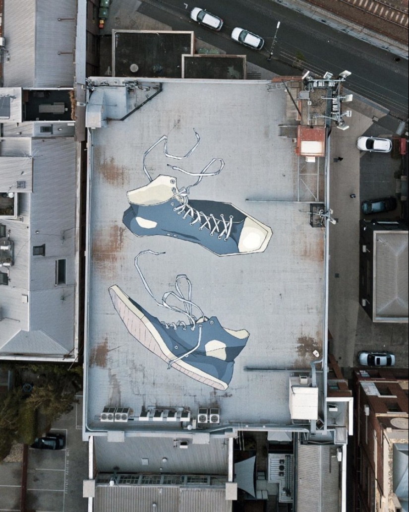 Giant murals on the ground by Australian Kitt Bennett