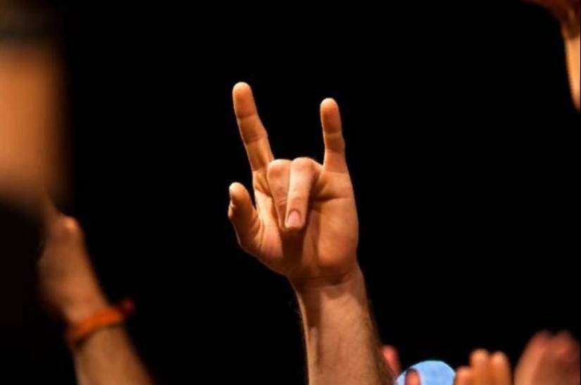 How did the "goat" gesture appear and what does it mean How did the "goat" gesture appear and what does it mean