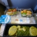 How different is the food of passengers in business class and economy class on the plane How different is the food of passengers in business class and economy class on the plane
