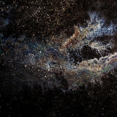 Illusory galaxies and constellations made of gasoline and oil on asphalt Illusory galaxies and constellations made of gasoline and oil on asphalt