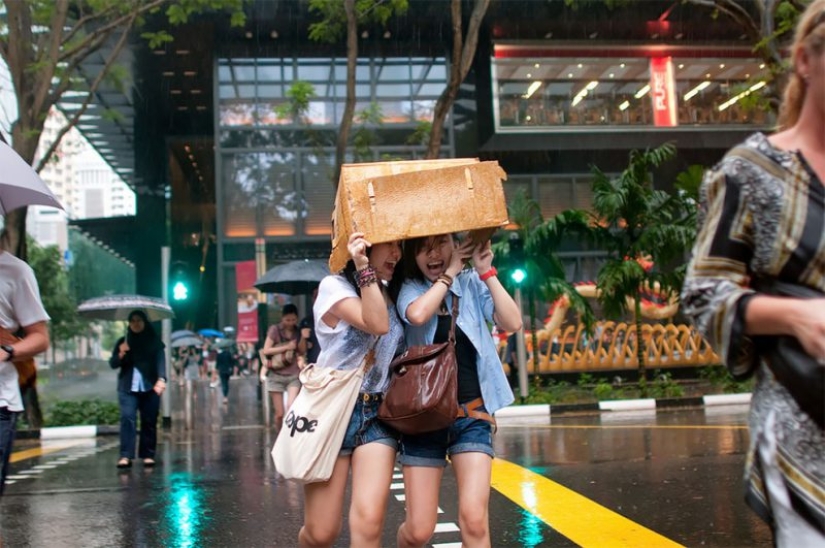 Rainy mood: a photographer from Singapore catches the emotions of people during a downpour